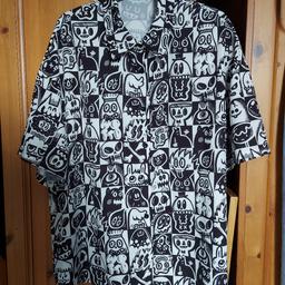 Black and white patterned shirt/blouse with skulls, faces etc, Size Large by Shein.
Worn once( for around 3 hours!) and washed.
I believe it is supposed to be worn oversized, then correct sizing (14)
Would be great for festivals!