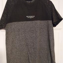 Mckenzie Tshirt 
Black/grey 
Size Medium will also fit teenager 13-14 (small 15 year old)
in good clean used condition from a clean smoke pet free home. 
collection B45.