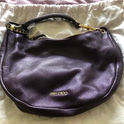 Jimmy choo purple handbag
Condition as new