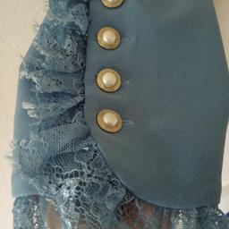 nuovi pantaloni Denny Rose tessuto elasticizzato,color turchese,fondo gamba impreziosito da bordi in pizzo e bottoncini gioiello,prezzo affare
