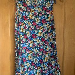 Floral summer dress with pockets. Label says size 22 but I think more like 18-20