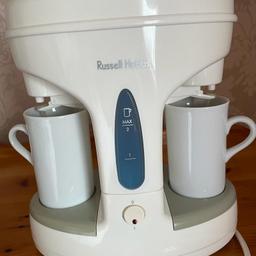 tea/coffee maker - The machine holds hot water only but this is great to have in the bedroom just add coffee or tea bags to the cups