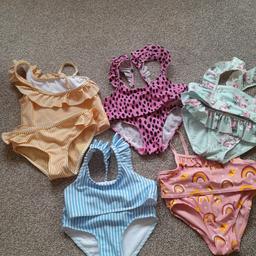 Girls bikinis. 4 are H&M brand, size 4-6 yrs, one is Primark age 5-6 yrs. All excellent condition.