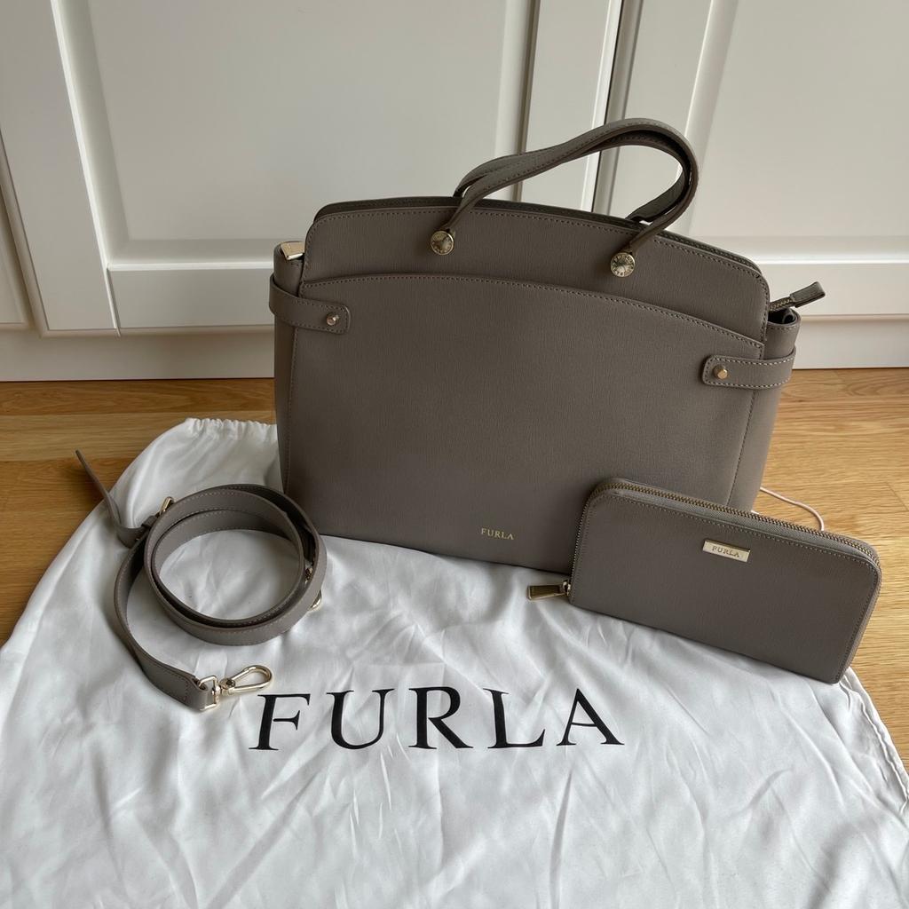 Neuwertiges Furla Set zu verkaufen
Tasche inklusive Portemonnaie
Farbe: grau/gold
In gutem Zustand, nur leichte Gebrauchsspuren