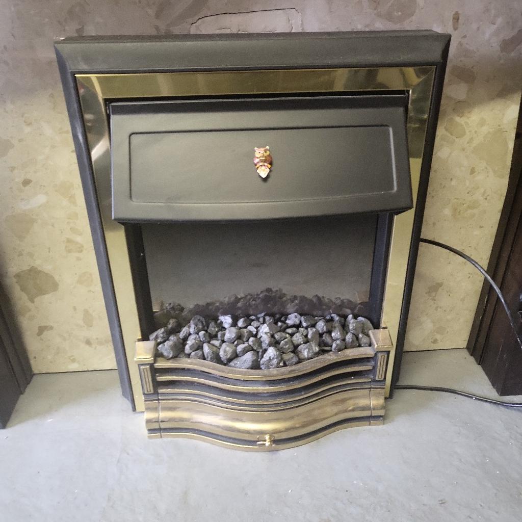 A beautiful Fireplace with marble back splash.
wooden frame and electric fireplace.

Collection Only B71