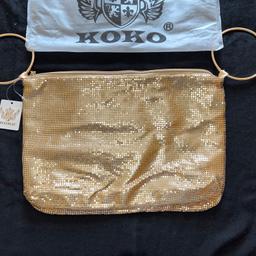BRAND NEW WITH TAGS AND DUST BAG GOLD KOKO LADIES CLUTCH STYLE BAG MADE OF GOLD METAL PLEATED DESIGN