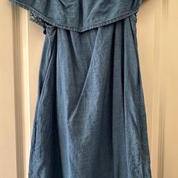 Off the shoulder denim dress
With pockets
In good used condition 
Size 14 
Has small blue stain on the inside (please see 4th picture) but barely visible on the outside (please see 5th picture) 
Collection South Norwood, SE25 4HH
Will post if buyer covers postage costs