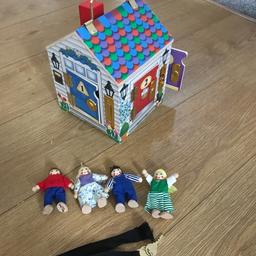 Melissa & Doug learning toy. 
4 dolls hiding behind 4 doors. 
Each door has a different shaped door bell and sound to the other . Each key is allocated to each door to find the hidden dolls. 
Each key lock is a different shape . 
Great learning toy