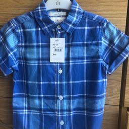 Lovely blue check short sleeved shirt
Debenhams Jasper Conran age 2-3 yrs