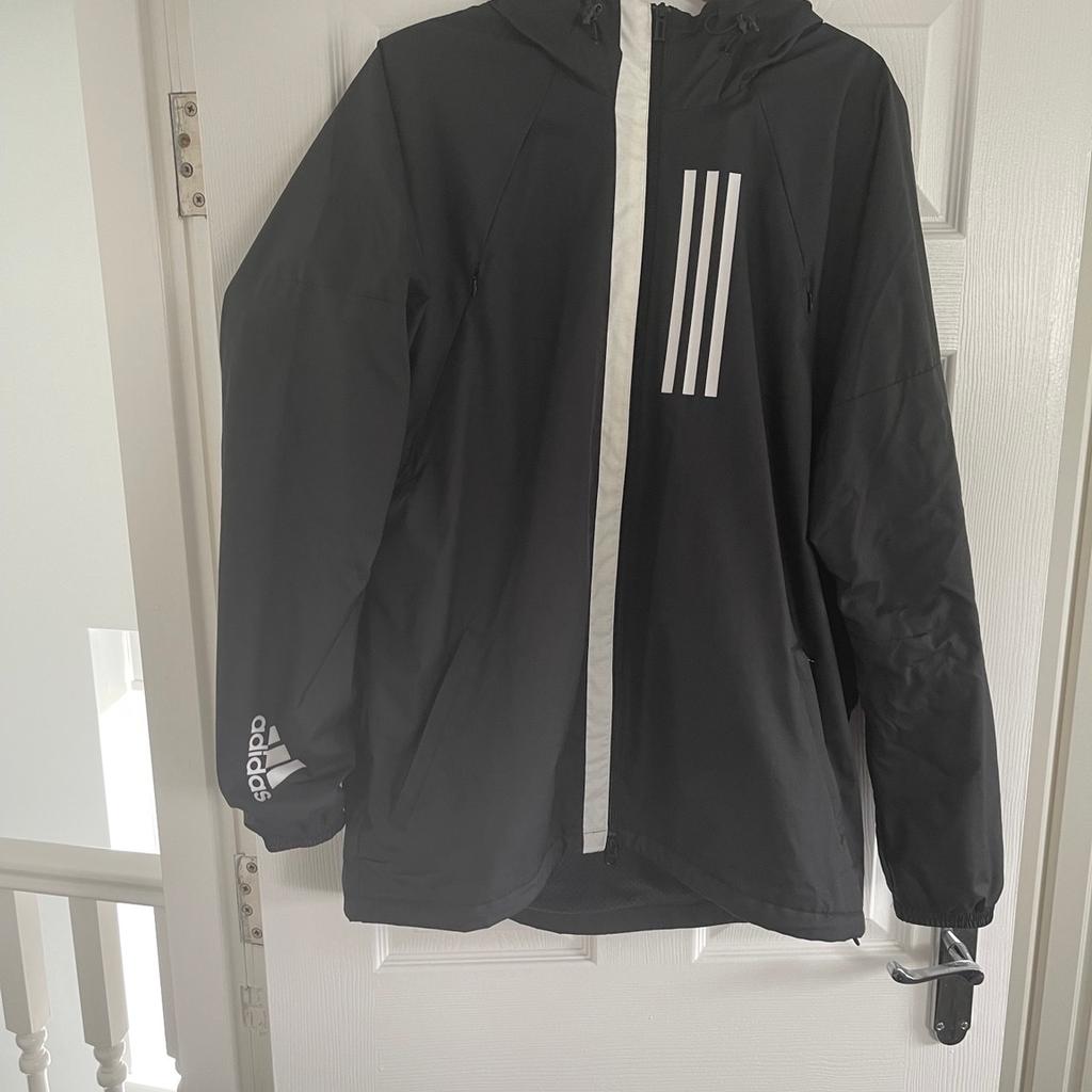 Adidas Raincoat with Hood

Black with White Adidas 3 Stripe Logo

Size Large

Collection Halewood