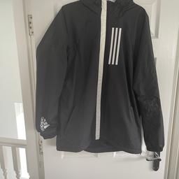 Adidas Raincoat with Hood

Black with White Adidas 3 Stripe Logo

Size Large

Collection Halewood