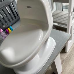 Great condition potty training toilet, with pretend flush noise and light, compartment in rear for wipes and removable/washable toilet pan. COLLECTION ONLY PLEASE