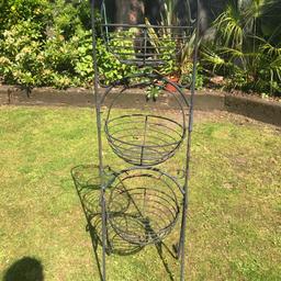 Wrought iron 3 tier flower basket stand. 
This is a lovely vintage stand with 3 baskets.
Each basket can be removed to fill and hooked back onto the stand.
In good vintage condition 
Viewing welcome