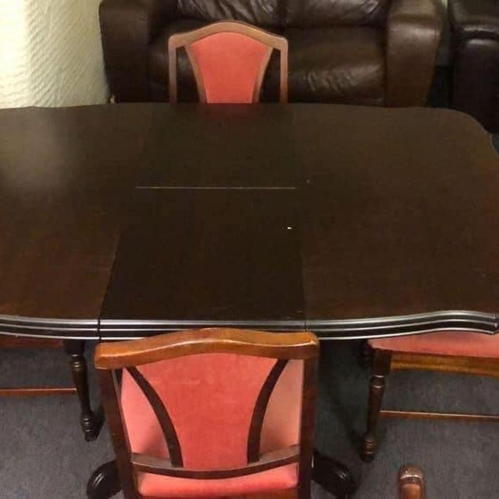 SECOND HAND DINING TABLE WITH 4 RED CHAIRS in S62 Parkgate for £80.00