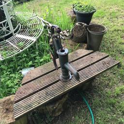 Was used in conjunction with a pond pump, pipe and decking still attached. Could be attached to water barrel or pond or just used as a garden feature.