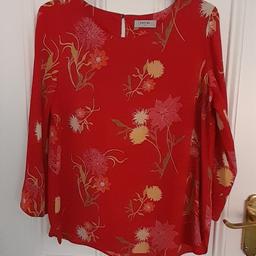 Red long line silky blouse 12.
Loose size 12
