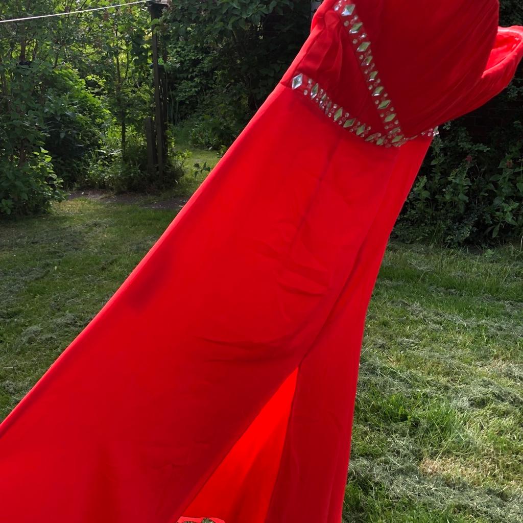 Beautiful Lipsy occasion dress. Lovely bright coral shade long dress with pretty ruched shaped bustier with rhinestone highlights looks amazing on . Only worn twice was over £70 . Stunning dress.