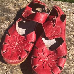 Cushion walk lifestyle summer shoes. Cherry red leather uppers with cut out details and strap across the foot. Super comfy with non slip soles . Pretty dolly Mary Jane style shoes . Good condition hardly worn .