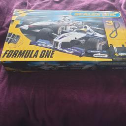 scalextric f1 all complete with lap counter one of the cars is damaged but still works