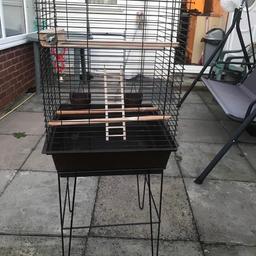 Parrot Bird cage for sale. Excellent condition. Comes with toys, feeders and perches. Also has pull out tray for easy cleaning. Measurements: Width 18 inches. Bredth 18 inches. Height 27 inches. Height when cage sitting on stand 47 inches. Can be delivered locally in Birmingham.