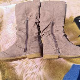 Girls size 13 Next Light Brown Calf Length Suede Boots Barely Worn. See photos for condition size flaws materials etc. I can offer try before you buy option if you are local but if viewing on an auction site viewing STRICTLY prior to end of auction.  If you bid and win it's yours. Cash on collection or post at extra cost which is £4.55 Royal Mail 48hr tracked. I can offer free local delivery within five miles of my postcode which is LS104NF. Listed on five other sites so it may end abruptly. Don't be disappointed. Any questions please ask and I will answer asap.