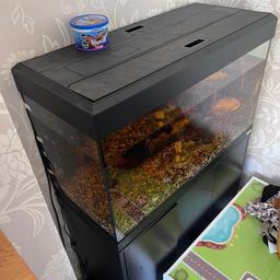 Fluval fish tank with stand comes with heater pump and light. Used but in good condition