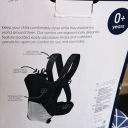 brand new 2 position baby carrier from Mothercare
baby can be positioned inward or outward facing and has cushion to support the head