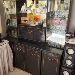 Black glass cabinet
Good condition with signs of ware. 
158cm length 190cm height 44cm width