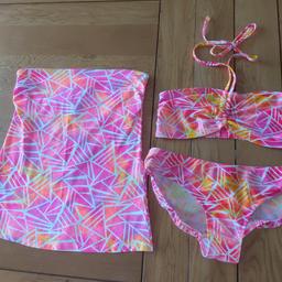 Bikini 3 piece set size 8 - 10, the bandeau top is not a swimwear piece but matches to wear over the top or on its own with ladies shorts etc, the bikini has been worn couple of times and the bandeau has never been worn, also has a bust support underneath..

more lovely things on my profile, any queries plse ask