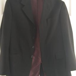Men's black formal suit jacket.
