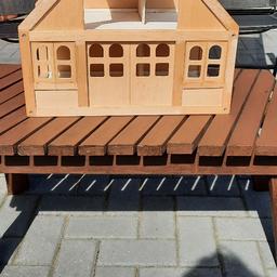sold as seen wooden dolls house
doors open and close 
length 14 ins
9 ins wide
£10