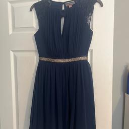 Navy blue Lispy dress with gold and sliver sparky band. Size 6 worn one