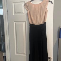 Pink and black Dorothy Perkins dress with black tie up belt and lace V back. 
Size 6 only worn  twice