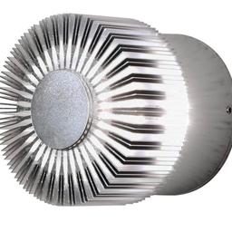 Konstsmide Outdoor Wall Lights/Monza Round Fan Style Up Down Modern Wall Lantern/LED High Power 1 x 3 Watt LED Wall Lamp/Clear Glass Lens/Solid Aluminium/IP54/Outside Light Aluminium , Small

Konstsmide Quality Up Down Exterior Outside Wall Lights - Independently Tested to Ensure High Standards
This high-quality aluminium wall mounted exterior lantern will be an eye-catcher on your façade. Outside lights will provide welcoming light to illuminate your outside space. Can be used indoors to create a nice feature
This up down wall light washes the wall with warm light and illuminates the area above and below; this quality wall mounted light brings a flair to your home and welcoming warm light
LED High Power 1 x 3 Watt CREE LED, lifetime approx. 20000 hours, HEP Driver, 3000K Warm White, 160 Lumens, CRI 80
Energy Efficiency Rating G, protection class IP54, Outdoor lights Mains Powered, Size Height 9cm, Width 9cm, Depth 8cm