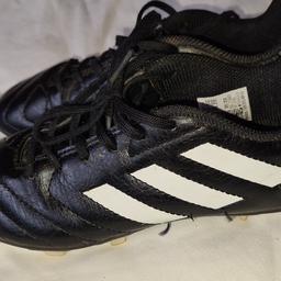 Adidas Boys/ Girls Moulded Studs Football Boots Size 2 very good condition. See photos for condition size flaws materials etc. I can offer try before you buy option if you are local but if viewing on an auction site viewing STRICTLY prior to end of auction.  If you bid and win it's yours. Cash on collection or post at extra cost which is £4.55 Royal Mail 48hr tracked. I can offer free local delivery within five miles of my postcode which is LS104NF. Listed on five other sites so it may end abruptly. Don't be disappointed. Any questions please ask and I will answer asap.