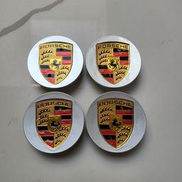 Porsche Emblem Badge Design, Set of four plastic wheel centre caps

Colour - Silver, Diameter - 65mm, Brand new