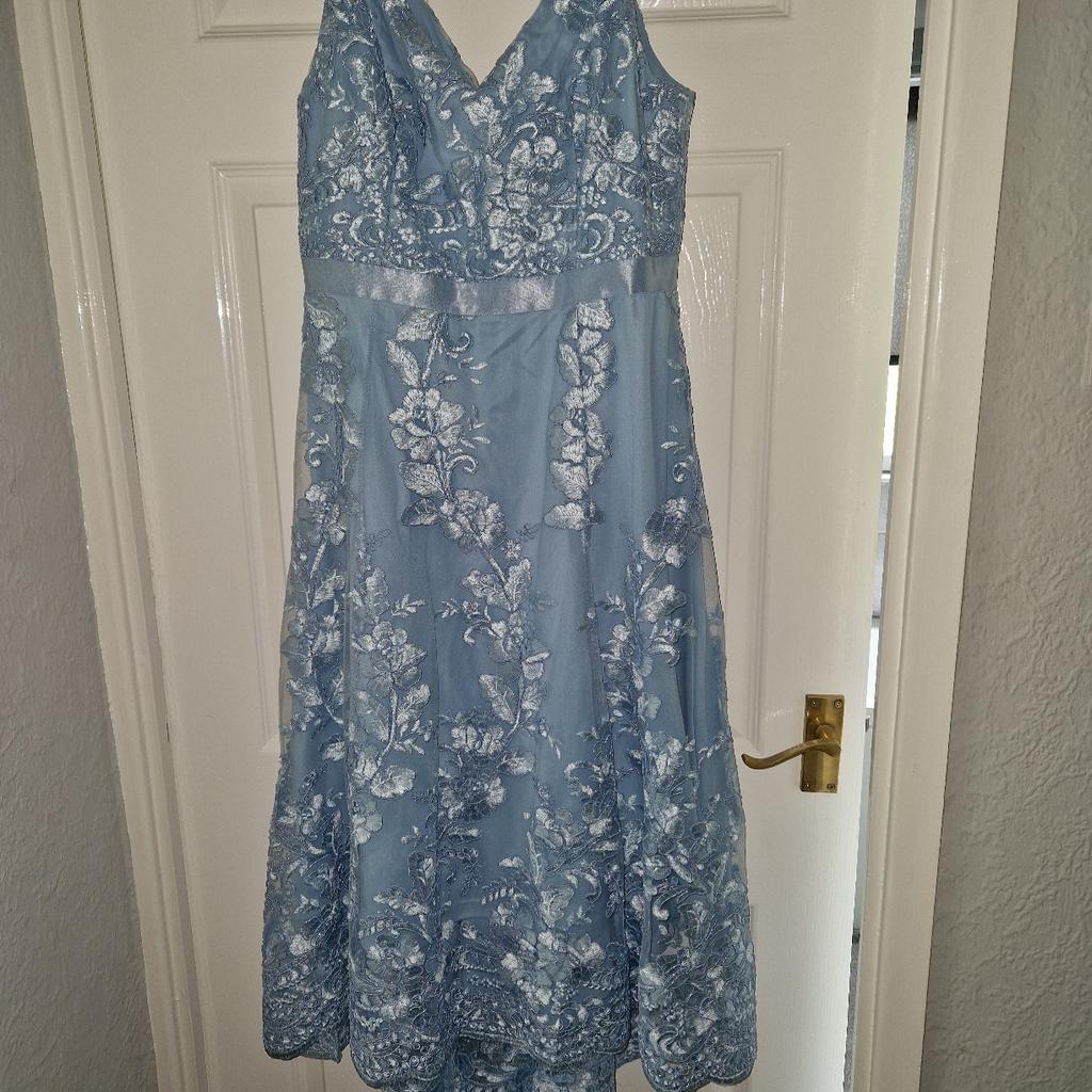 beautiful lace dress which is slightly longer at the back. Adjustable straps, fully lined and back zip. wore for only a few hours at sons wedding . As new . size 16. smoke and pet free home