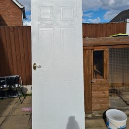 1 white wooden internal door. Hinges and door handles included. Good condition. 38 x 70 inches. Collection location WV14 0UE