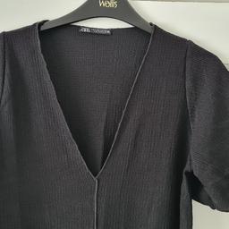 Zara Dress in black size : Medium. Never been worn..