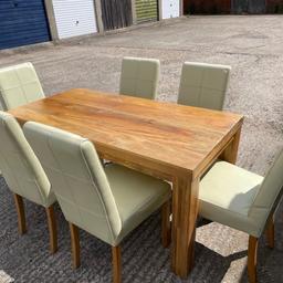 #valentine table and six chairs in good condition and mango wood