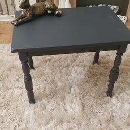 vintage solid table, ideal for a coffee table ,recently painted acrylic furniture paint. height is 20inch /51cm by 26by18inches 66by46cm