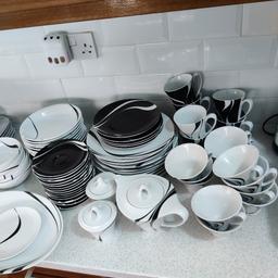 Hi I am selling this lovely dinner set. Hardly used. only one odd piece was used. All in storage. Just like new. Grab a bargain. Cost over £100's. This a very expensive stylish classic set. A real bargain
9 big plates
9 medium plates.
10 deep large plates
5 soup bowls. 2 are chipped if you like can add them in
14 saucers
12 tea cups
7 mugs
one kettle
two sugar pots
one big flat plate
one big deep bowl. is chipped can include of you want.
open to near offers