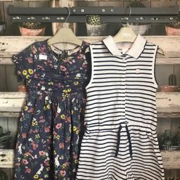 THIS IS FOR A BUNDLE OF GIRLS CLOTHES

1 X NAVY AND WHITE STRIPPED JUMPSUIT FROM NEXT - WORN A FEW TIMES BUT IN EXCELLENT CONDITION
1 X BLUE MANTARAY DRESS WITH BIRD AND FLORAL THEME - USED BUT IN GREAT CONDITION

PLEASE SEE PHOTO