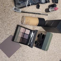 mac NC25 New  extra pump and cover 
eyeshadow pallet New 

eyebrow/ eyeliner brush New 

lipstick in light pink New

retractable brush with cover - New