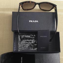 Nagelneue, noch nie getragene Sonnenbrille von Prada, braun/gemustert, komplett mit Etui, verpackten Brillenputztuch, sowie Originalkarton, NP 229,00€, für 139,00€, war ein Geschenk, leider steht Sie mir nicht.