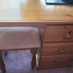 Pine wood dressing table with mirror & chair, there is a few marks on the wood as seen in the pictures. However, this table can be repainted. I can deliver if not too far. 16" length 35" width