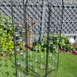 - Beautiful arched, interlocking, black metal screen divider, complete with 39 glass tea light holders.
- 13 tea lights holders per screen panel.
- Fabulous room or garden feature item.
- 120cm total width x 161cm height.
- Perfect condition. As new.
- Collection only.