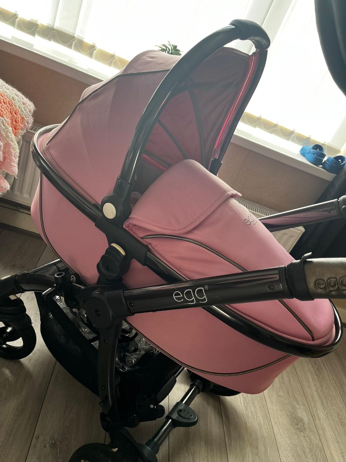 Pink egg pram and matching changing bag in WV10 Wolverhampton for £170. ...