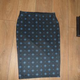 LADIES STRETCHY SKIRT FROM M&S WITH SMALL SPLIT AT BACK SIZE 12