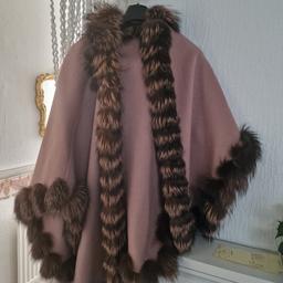 new cashmere-wool cape
one size with real fur
welcome offers